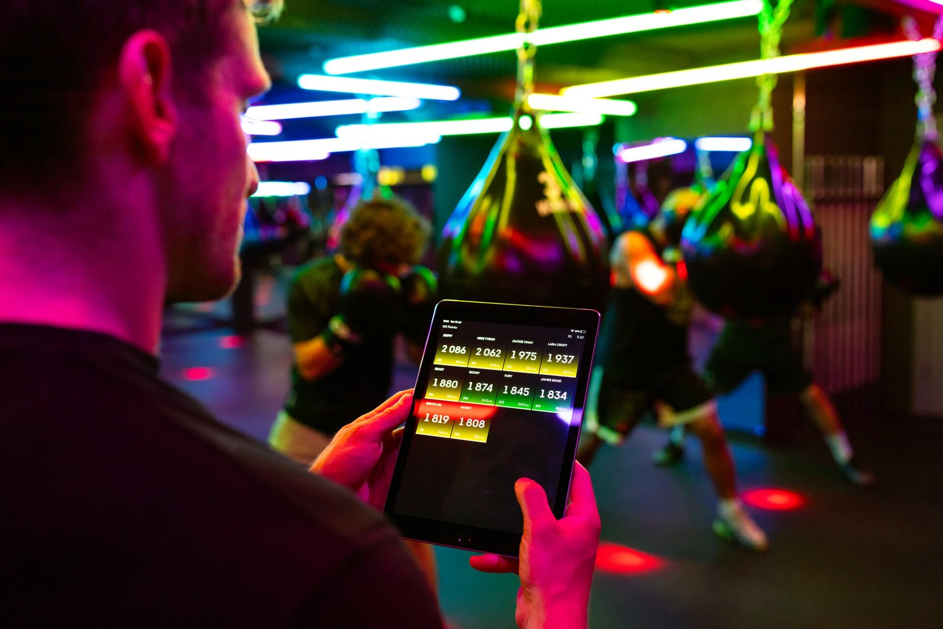 Person checking gym related information on their iPad